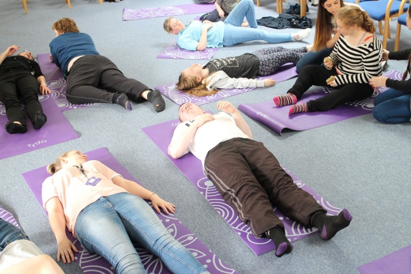Pupils doing Yoga