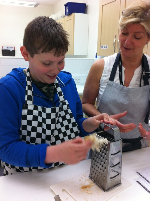 New Struan School Sam making burgers