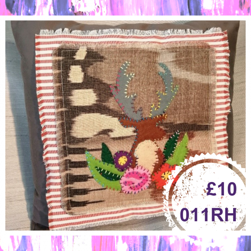 A small square cushion with a stag, £10, 011RH
