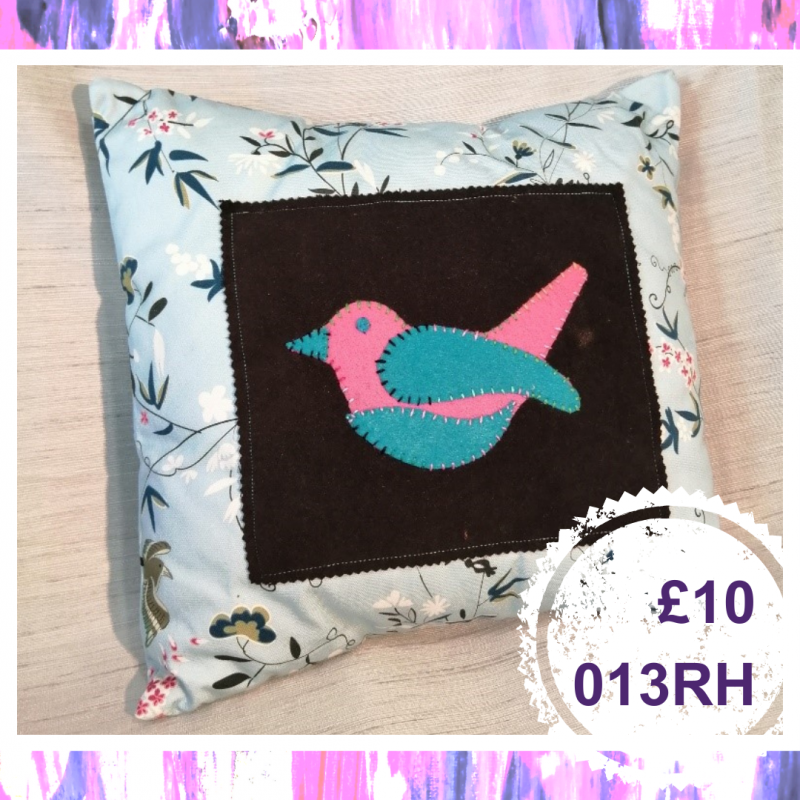 A small square bird cushion, £10, 013RH