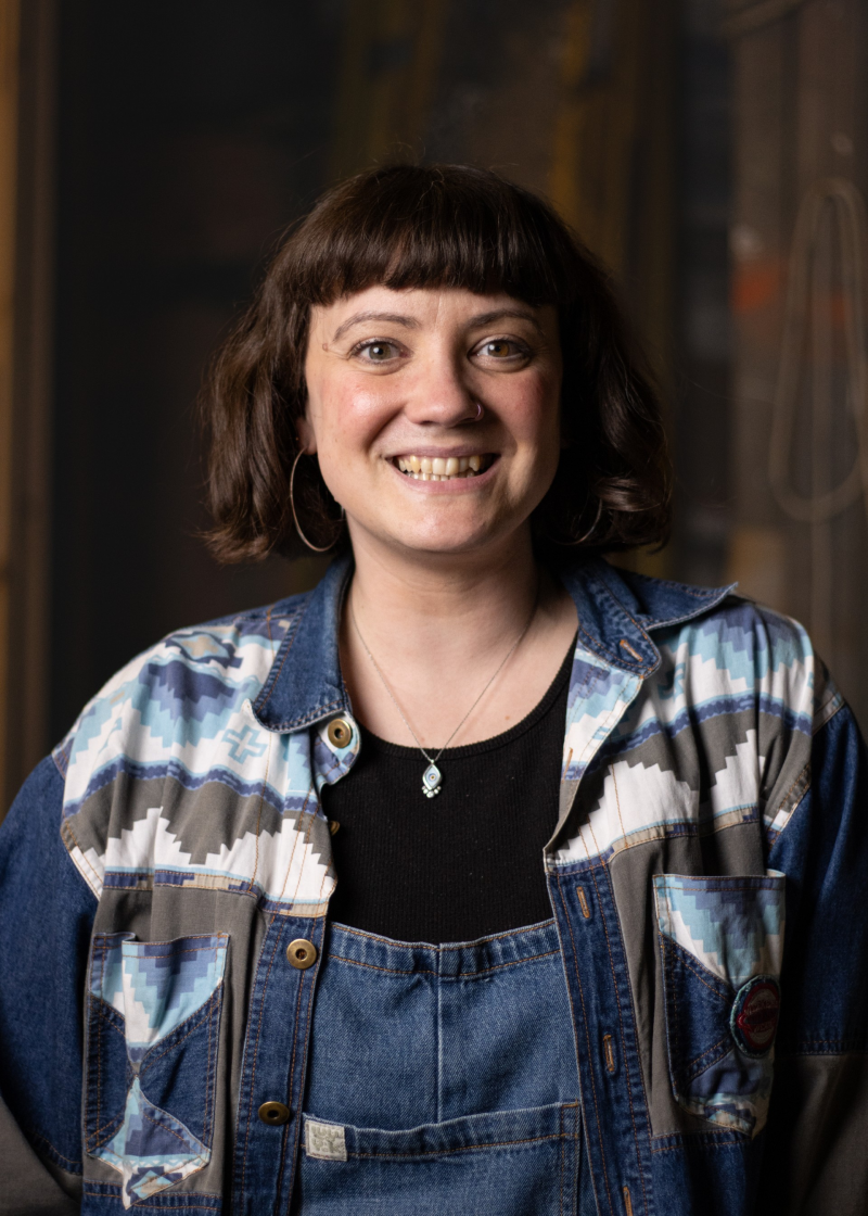 Image is of Dramatherapist Lizzie Palmer, smiling for the camera