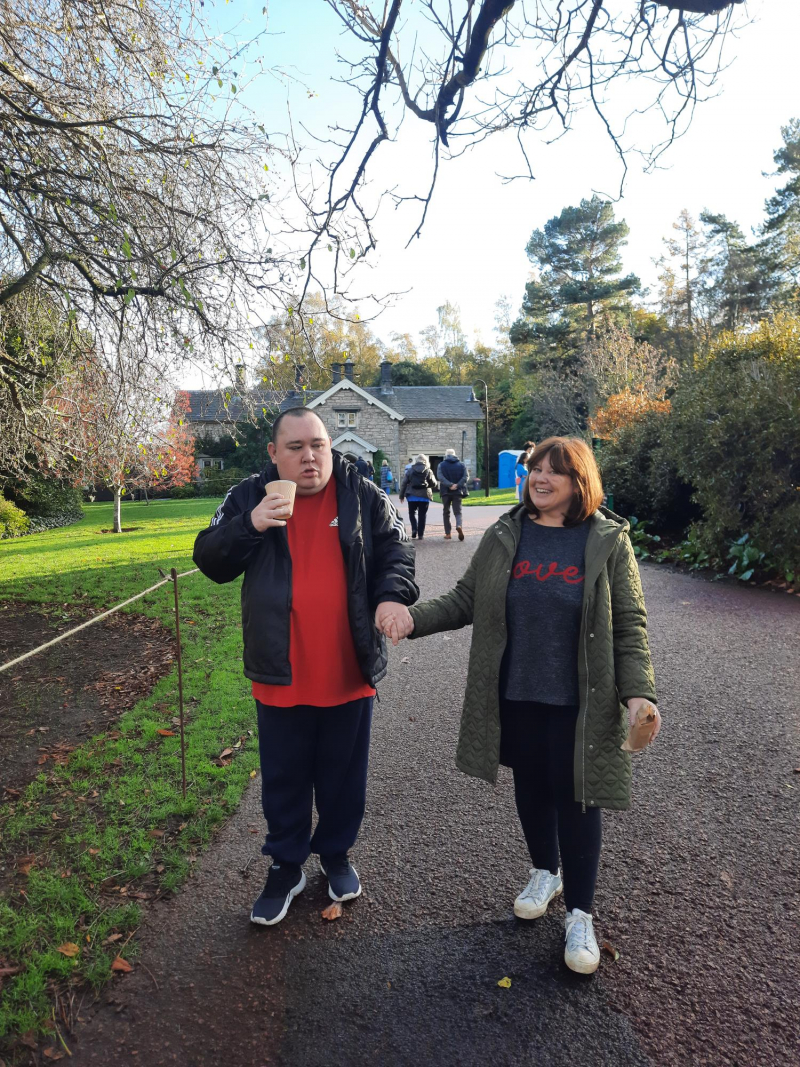 People walking along a path, outdoors