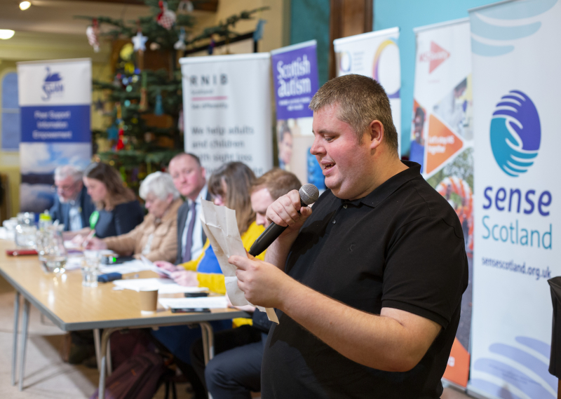 Autistic attendee David Weir, asking representatives from the main political parties a question during the event. 