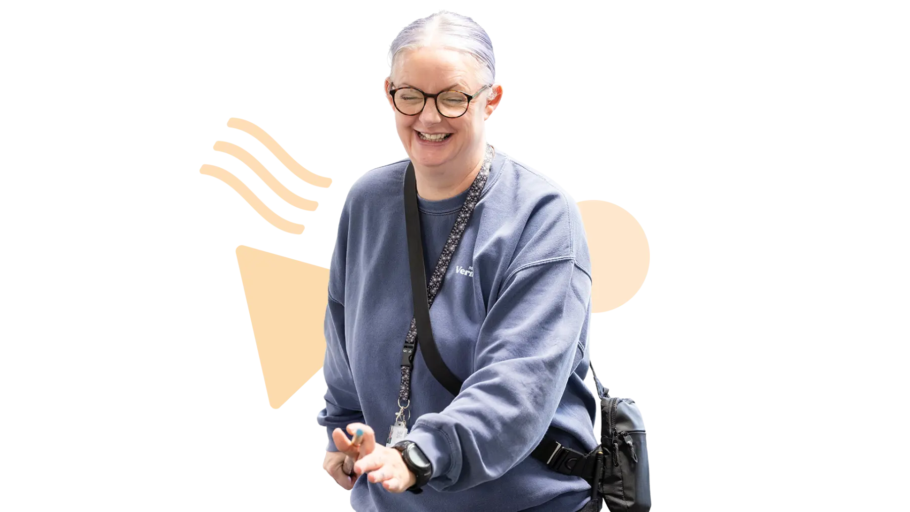 Image is of a person laughing and holding a pool cue