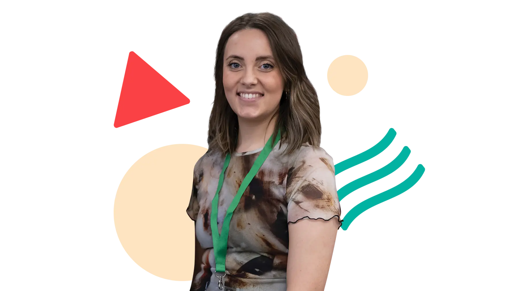 Image is of a person smiling at the camera, wearing a green lanyard