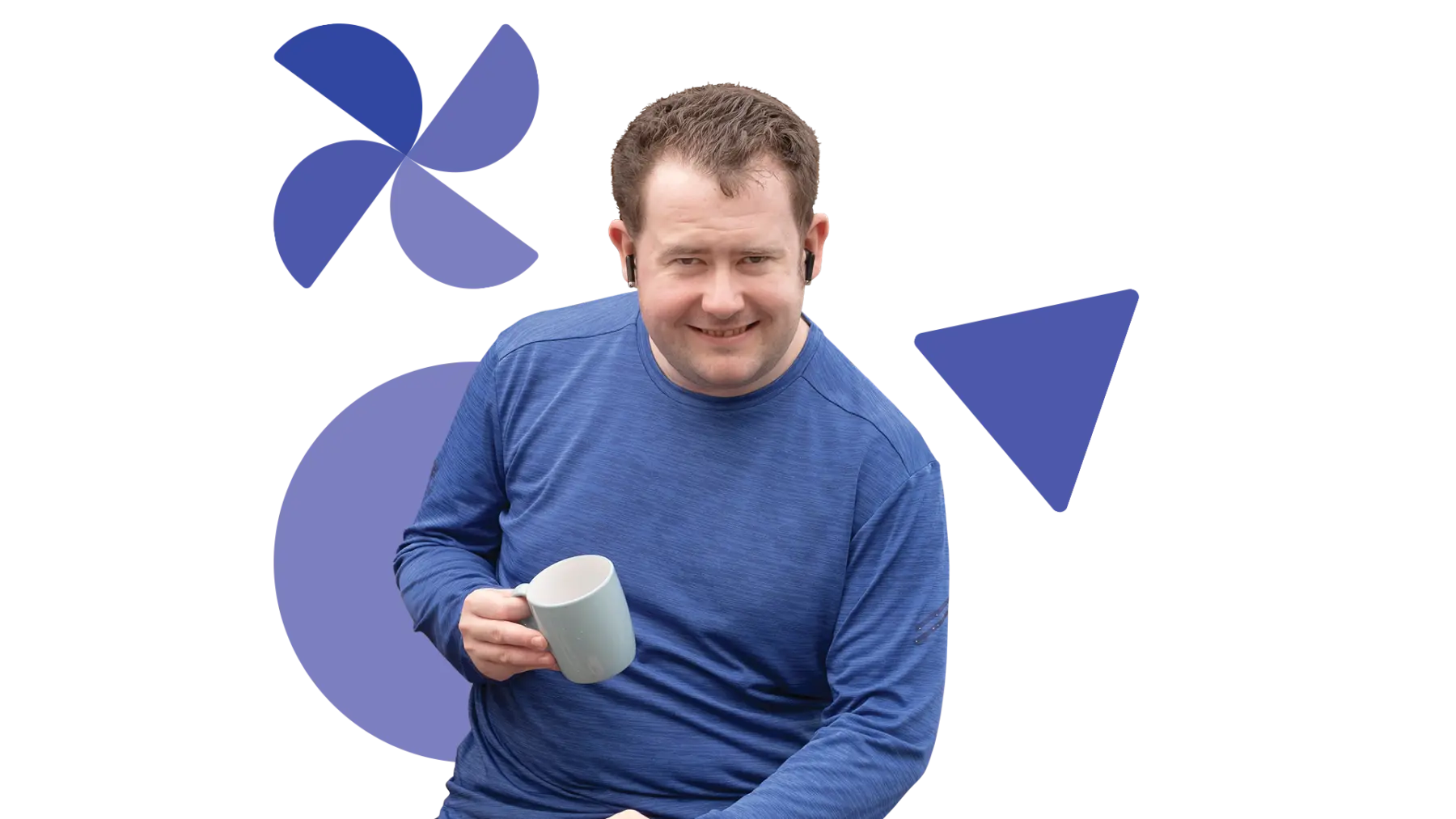 Image is of a person holding a mug and smiling