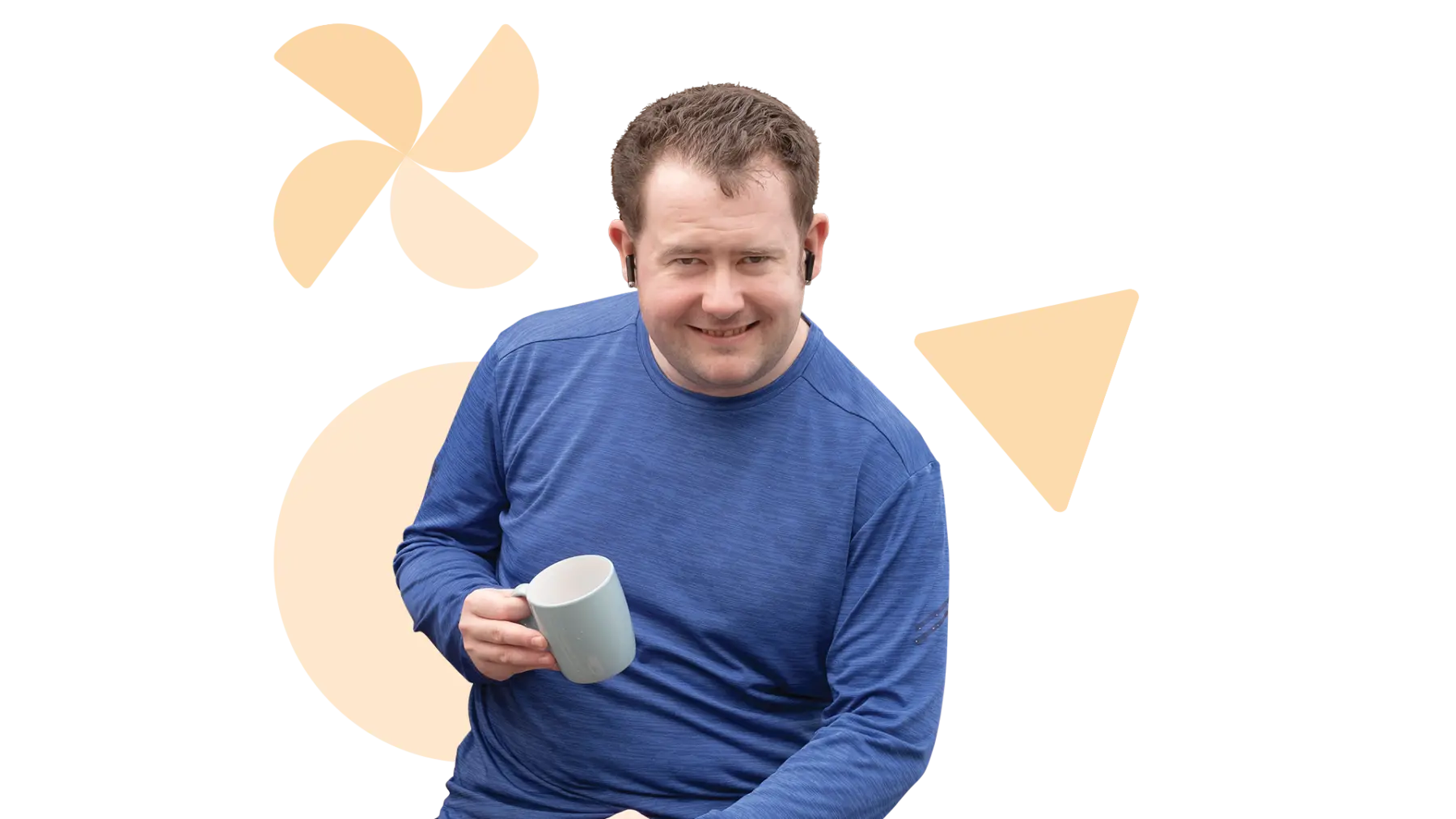 Image is of a person holding a mug and smiling
