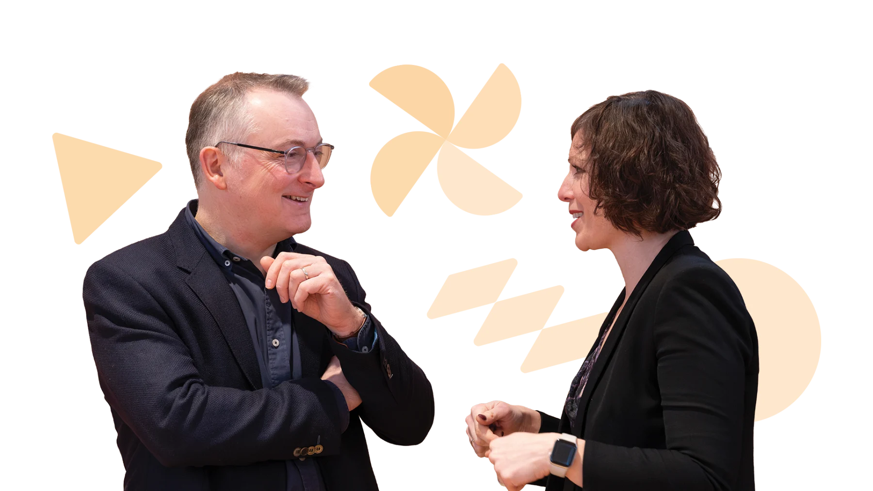 Two members of Scottish Autism staff talking