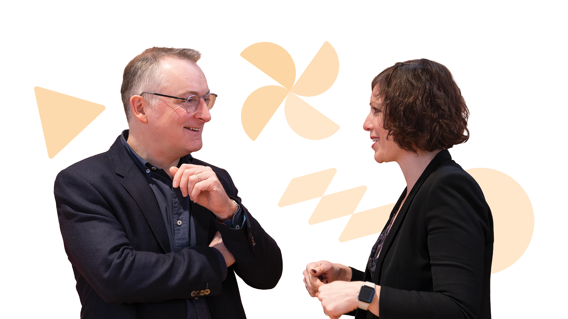 Two members of Scottish Autism staff talking