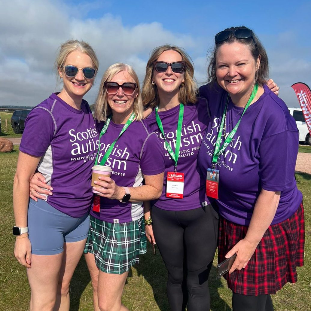Image of four Scottish Autism supporters taking part in the Kiltwalk