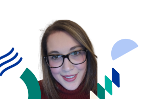 Image is of Community Advice Services Manager Zofia, wearing glasses and smiling for the camera