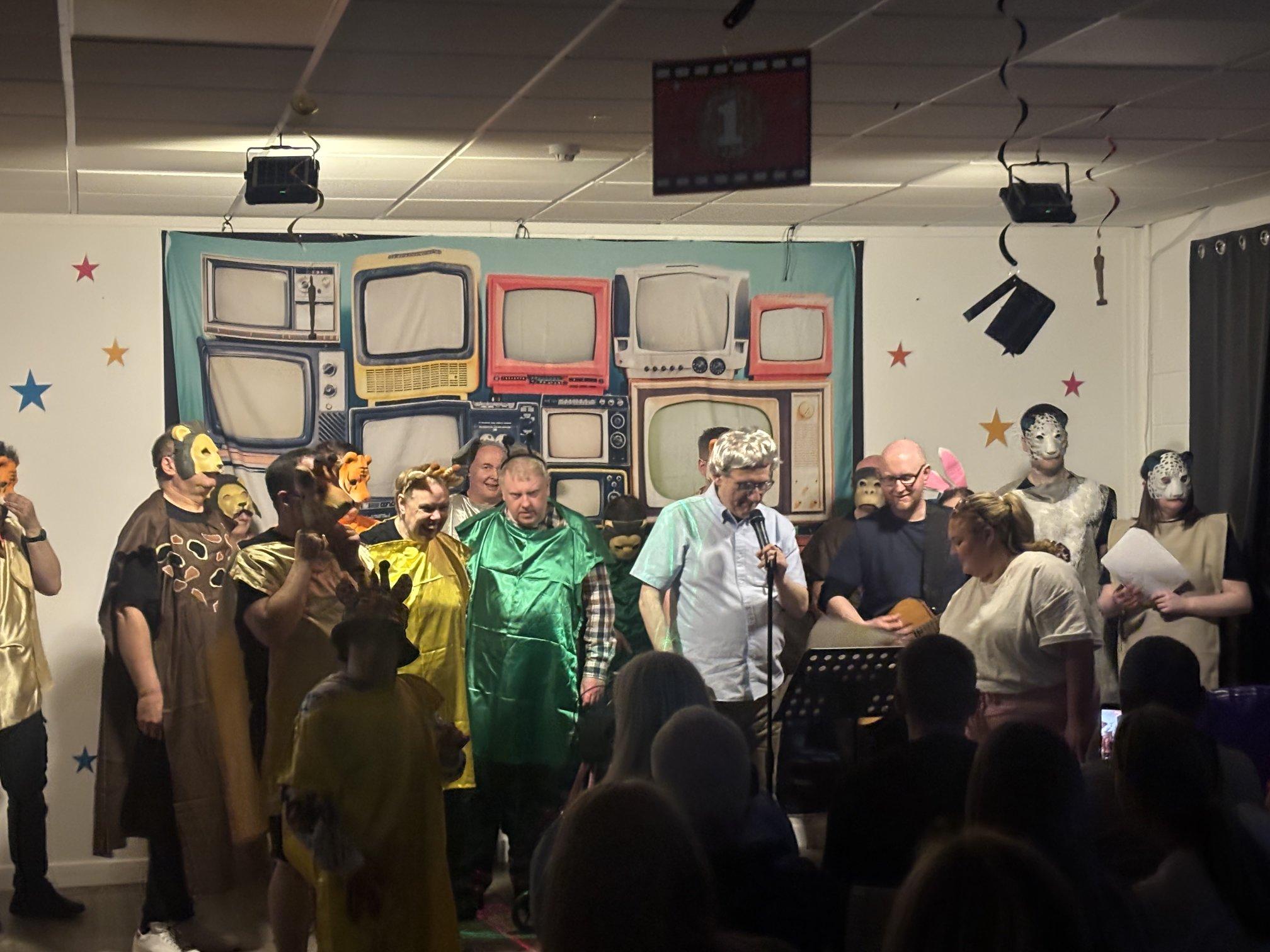 Inspire musical theatre group gathered on stage